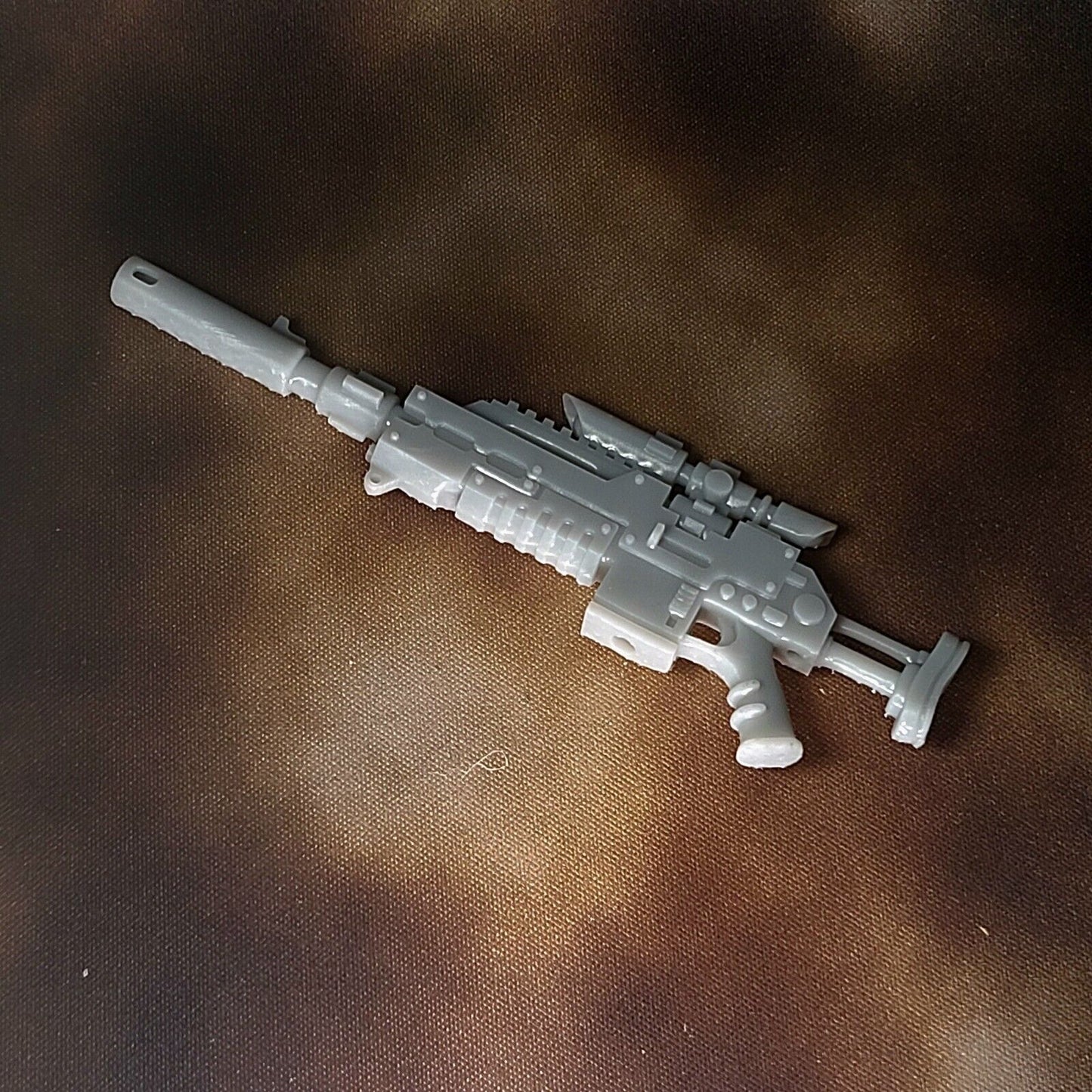 A 1:18 scale model of the Mark III Shrike Sniper Rifle, designed for JoyToy's Space Marine action figures.