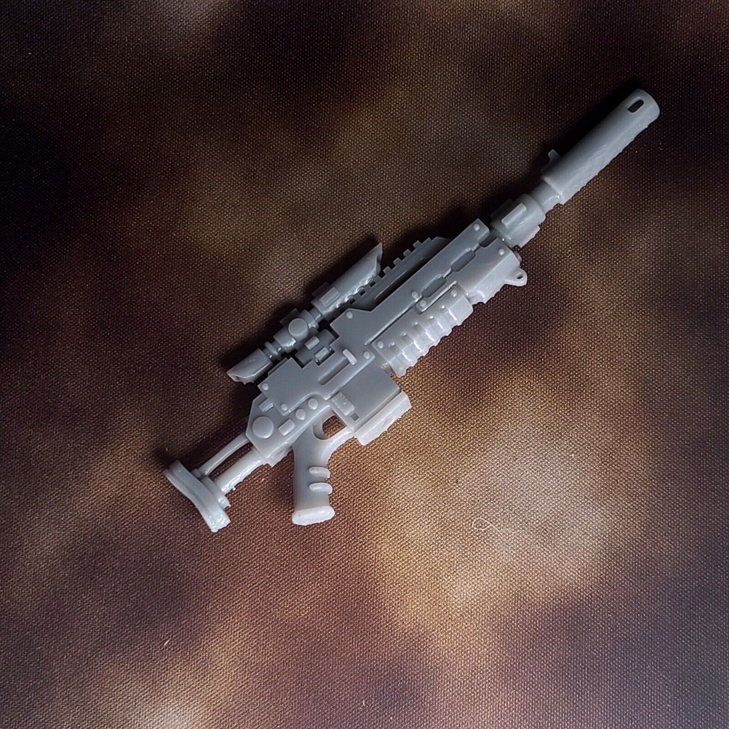 A 1:18 scale model of the Mark III Shrike Sniper Rifle, designed for JoyToy's Space Marine action figures.